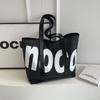 Bolsa de Lona Estilo Novo 2026 para Mulheres, Bolsa de Ombro Versátil Estilo Coreano, Bolsa Escolar Artística e Simples de Grande Capacidade para Alunas, Bolsa Tote de Lona