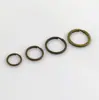Fabricantes de Foshan llavero plano anillo de hebilla anillo colgante de bronce metal doble accesorios de joyería DIY