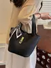 Bolso Estilo Coreano Bolso Cesta de Verduras 2026 Nuevo Moda Verano Bolso Cubo con Patrón de Lichi Bolso Cruzado de Color Sólido de Alto Valor
