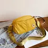 Bolsa Transversal Estilo Simples Feminina 2026 Nova Versátil Leve Impermeável Nylon Bolsa para o Dia a Dia Multicamadas Bolsa para Celular de Viagem