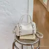 Bolso de mano de lujo nicho de alta gama para mujer, nuevo otoño 2026, bolso versátil vintage para el hombro y cruzado para el día a día