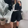 Conjunto de cárdigan con capucha de punto suelto de otoño de alta gama para mujer Dongdaemun, Corea + pantalones cortos de pierna ancha con cintura de cordón