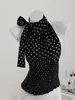 Camiseta sin mangas de verano estilo callejero europeo y americano transfronterizo, cuello alto único tipo halter, ajuste ceñido, sin mangas, estampado de lunares en negro