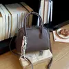 Bolsa retrô estilo coreano com formato de concha para mulheres, nova coleção 2026, bolsa tote casual com tema de boliche, bolsa de ombro e bolsa transversal versátil