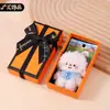 Colgante de peluche de cordero de dibujos animados creativos con pelo rizado, lindo babero y mejillas, llavero de cordero de peluche, decoración para mochila