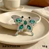 Broche de mariposa con diamantes de imitación esmeralda de lujo, estilo retro y accesible, para mujer, antiexposición, para chal, botón, accesorio pequeño para chaqueta de traje.
