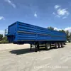 Semirreboque basculante de 4 eixos para transporte de grãos com elevação do eixo dianteiro e basculamento lateral duplo para transporte de areia, cascalho e terra