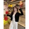 Chaqueta cárdigan negra 2026 nuevo suéter de moda de otoño para mujer principios de otoño estilo coreano prenda exterior top de punto
