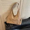 Bolsa de mão simples transfronteiriça de grande capacidade, nova moda outono 2026 bolsa de ombro versátil, bolsa de mão leve para o dia a dia