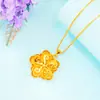 Pingente de ouro de imitação de luxo 24k Pingente feminino Bauhinia estilo popular europeu e americano de jóias de ouro de areia atacado
