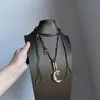 Collar Colgante Luna Dorada Estrella de Ocho Puntas Diseño de Nicho Cadena Larga de Suéter Moda Retro Collar Personalizado para Mujer