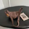 Bolsa simples e elegante em formato de dumpling para mulheres, nova moda 2026, grande capacidade, versátil bolsa de ombro e bolsa transversal para o outono