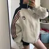 Sudadera de moda de calle americana con empalme de rayas y cuello de polo para mujer en primavera y otoño, cálida, suelta y casual, forrada de forro polar