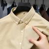 Otoño 30 camisa de algodón de manga larga con solapa de color sólido para negocios y desplazamientos para hombres de mediana edad, versión de ajuste de primavera y otoño