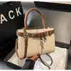 Bolso Transfronterizo para Mujer 2026 Primavera Nuevo Estilo Llavero Bolso de Mano de Moda Bolso Tote de Hombro Único de Gran Capacidad para Mujer
