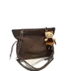 Bolso Cubo Retro de Gran Capacidad para Mujer 2025 Otoño e Invierno Nuevo Bolso de Hombro con Cadena Moda de Nicho Bolso Cruzado para Viajes