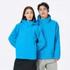 26 Otoño/Invierno Chaqueta Softshell Tres en Uno Dos Piezas Cortavientos Impermeable para Exteriores Senderismo Montañismo Abrigo con Capucha para Pareja