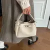 Bolso Tote Pequeño Súper Caliente para Mujer 2026 Nuevo Verano Popular de Gama Alta para Viajes Diarios Hombro Único Cruzado Bolso Cubo