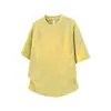 Top de hombre de estilo coreano minimalista amarillo verdoso de manga corta, nuevo para el verano 2026, con bloques de color, costuras contrastantes y dobladillo curvo, holgado y casual