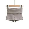 Pantalones cortos de punto de tiro bajo con puño de diseño nicho estilo europeo y americano para chicas sexys, corte ajustado que realza la figura, hot pants modernos de color sólido