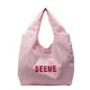 Nuevo Bolso de Hombro con Estampado de Letras de Nicho 2026 Bolso de Lona Versátil Más Vendido para Viajes Diarios Casual Bolso de Compras de Gran Capacidad