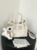 Yuezhi 2026 Verano Nuevo Versátil de Moda Texturizado Pequeño Bolso de Diseño Bolso Cruzado Versión Coreana de Mano Plegado Bolso Cubo