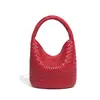 Bolso de mano simple de diseño original estilo cesta para mujer, nuevo bolso cubo tejido con patrón de espiga, tacto de alta gama, bolso de hombro cruzado único