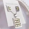 Nuevo especial transfronterizo explosión de tendencia europea y americana titanio acero alta calidad color collar pendientes traje femenino joyería de concha real