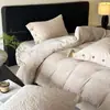 Conjunto de quatro peças de luxo leve de veludo de leite, espessado para o inverno, flanela, capa de edredom de veludo coral, lençol de cama, roupa de cama de inverno