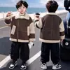Amazon Comercio Exterior Transfronterizo Europa y América Hombres Mujeres Niños Otoño Invierno Nueva Chaqueta Patchwork de Cuero Sintético Abrigo con Piel Integrada