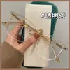 La versión coreana de gafas ultraligeras para mujeres con miopía se puede equipar con marco de ojo liso anti-luz azul marco profesional con miopía