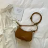 Bolsa de Axila Moda Retrô Feminina 2026 Primavera Nova Simples Transversal Bolsa Dumpling Estilo Coreano Alto Valor Ombro Único Bolsa Feminina