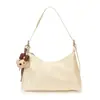 Bolso de mano de nicho estilo coreano, nueva colección otoño 2026, bolso de hombro y bolso cruzado casual de color sólido de alta calidad