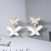 Brincos de design nicho estilo coreano flor borboleta de alta qualidade Amazon mais vendidos elegante simples luxo leve requintado