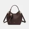 Bolso de mano de mujer OEM hecho a medida, bolso tipo cubo con patrón de lichi vintage, bolso tote para mujer, bolso de hombro versátil para el trabajo, bolso cruzado