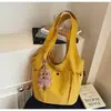 Bolso de Hombro Transfronterizo 2026 Estilo Coreano Nuevo con Múltiples Bolsillos, Bolso Cubo de Moda de Gran Capacidad, Bolso de Mano Versátil de Tela para el Trabajo