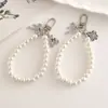 Nuevo Llavero de Perlas Colgante de Cuentas Colgante de Lazo Llavero de Oso con Lazo Placa Metálica Pulsera de Perlas