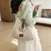Bolso tejido para vacaciones en la playa para mujer 2026 nuevo modelo bolso de mano de punto hueco gran capacidad bolso de hombro axila