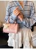 Bolso de Mano Pequeño Texturizado Transfronterizo para Mujer 2026 Estilo Nuevo de Primavera Bolso Cruzado de Hombro Único de Cilindro Moderno Sencillo