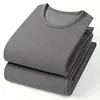 Conjunto de ropa interior térmica sin costuras de terciopelo alemán transfronterizo para hombre, pantalones y top térmicos elásticos de otoño, conjunto de capa base térmica para hombre