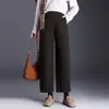 Pantalones de pierna ancha acampanados de cachemir grueso con cintura elástica para mujer 2026 Otoño/Invierno Nuevos de cintura alta adelgazantes con temperamento para el trabajo