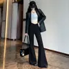 Pantalones acampanados negros para mujer, colección otoño 2026, diseño que alarga las piernas, tiro alto, estilo supermodelo, corte ajustado, elásticos, casual, pantalones de campana