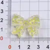 Accesorios de Resina Decoraciones DIY Charms para Zapatos Pegatinas para Botellas de Agua Accesorios para el Cabello de Niños Cubiertas para Popotes Lazo en Forma de Ola Tamaño Pequeño