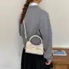 Bolsa transversal de alta qualidade com laço estilo coreano para mulheres, nova bolsa de ombro de moda de nicho 2026, bolsa de mão versátil