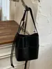 Bolsa de ombro feminina estilo retrô, nova coleção 2026, design moderno de outono, exala uma vibe sofisticada e elegante, apresentando um design de bolsa saco de grande capacidade