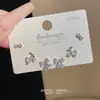 Brincos pequenos e requintados, banhados a ouro real, design de laço e cereja, únicos, conjunto de três pares, brincos de tarraxa