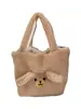 Bolsa de felpa con orejas de oso tridimensionales linda de otoño e invierno, suave y adorable, adecuada para niñas y estudiantes, versátil para el uso diario y las compras