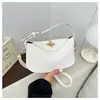 Bolso de hombro cruzado simple y elegante de gran capacidad con cierre de broche vintage texturizado, modelo nuevo 2026 para mujer