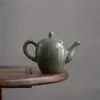 Tetera de cerámica individual para uso doméstico, juego de té kung fu de porcelana blanca estilo horno Ru con separación de té y agua, tetera de arcilla púrpura