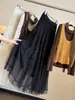Falda de malla con ribete de encaje, nueva colección de otoño para mujer, de cintura alta, adelgazante, estilo coreano, elegante y deslumbrante falda larga de línea A con dobladillo acampanado.